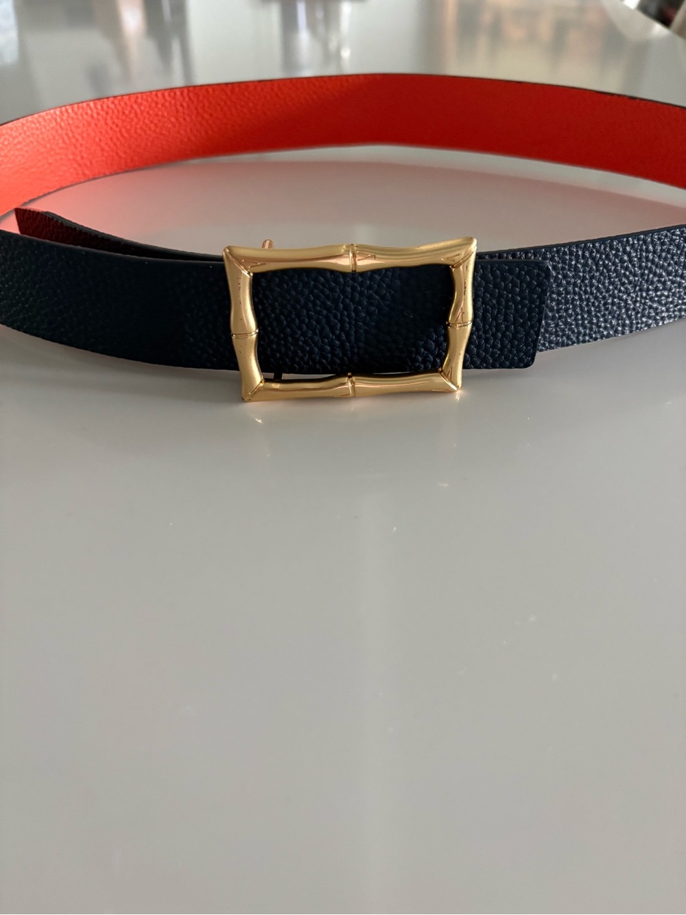 Navy and orange J. McGlaughlin pebbled leather with gold bamboo buckle L